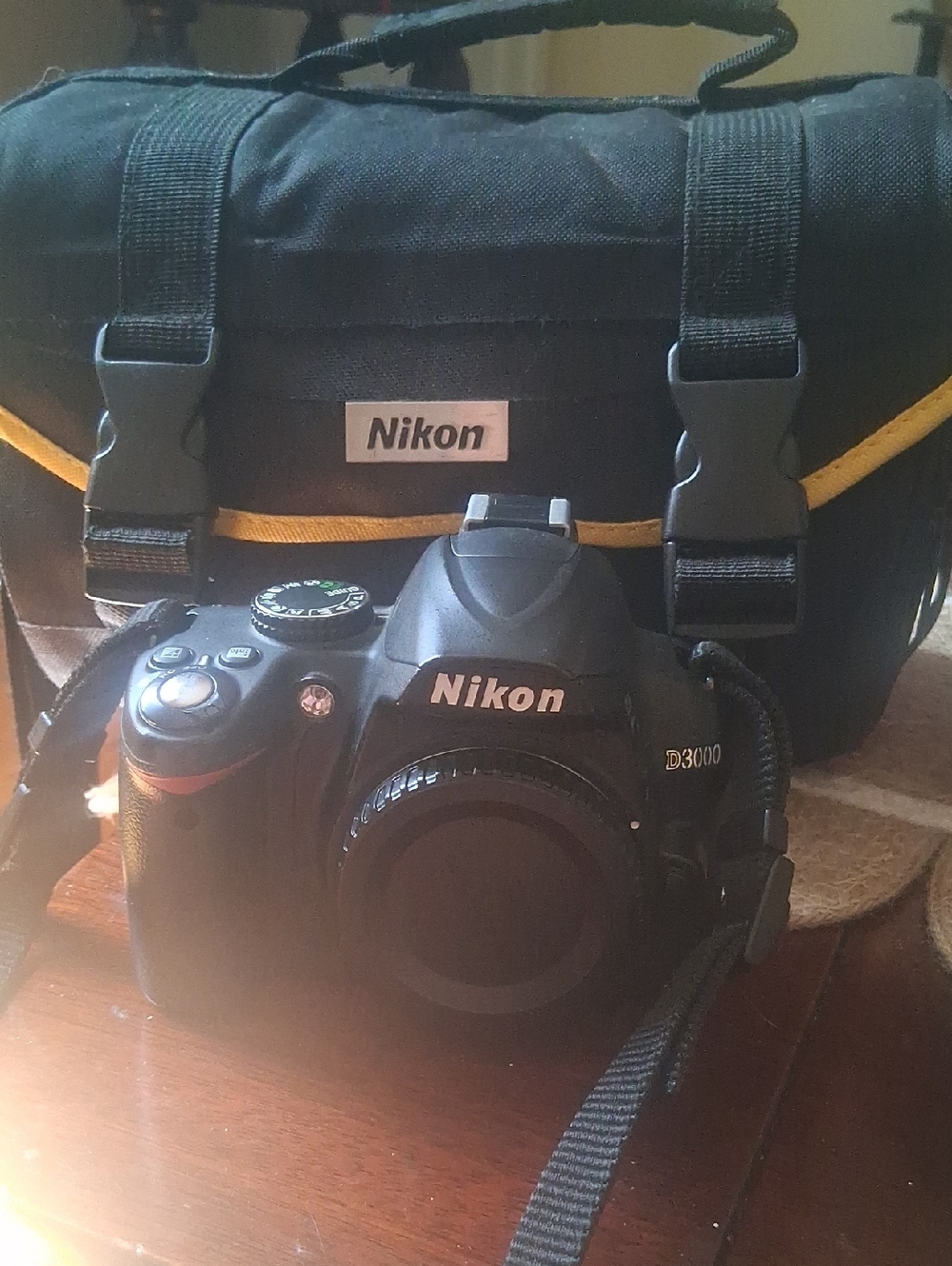 Nikon D3000 DSLR Camera with Black and Yellow Carry Bag